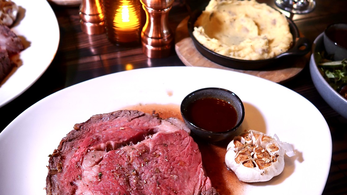 Certified Angus Beef prime rib with roasted vegetables and au jus
